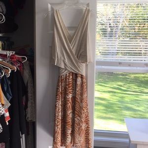 Mid length dress with pattern on bottom.